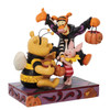 Front right angle view of the Disney Traditions by Jim Shore Winnie the Pooh & Friends Halloween Figurine, 6010864.