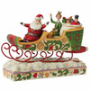 Front angle view of the Buddy with Santa Claus in Sleigh 'Elf' Figurine by Jim Shore, 6013938.