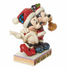 Front right angle view of the Disney Traditions Mickey & Minnie Santas Figurine by Jim Shore, 6013058.