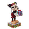Front right angle view of the Disney Traditions Santa Mickey Mouse with Gift Figurine by Jim Shore, 6013060.