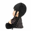 Left side view of the KidRobot Wednesday Addams 7.5in Phunny Plush Doll, KR18262.