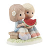 Front right angle view of the Precious Moments 'You're One In A Melon' Summer Couple with Watermelon Figurine, 213003.