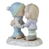 Front left angle view of the Precious Moments Winter Couple Kissing Figurine - I'm Snow In Love With You, 231019.