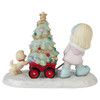 Back view of the Precious Moments Girl Pulling Christmas Tree in Wagon Figurine, 231041.