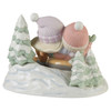 Back view of the Precious Moments Couple Snow Tubing Figurine 'Away We Go In The Snow' Limited Edition, 231036.