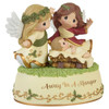 Front right angle view of the Precious Moments Angels with Baby Jesus Musical Figurine 'Away In A Manger', 231403.