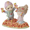 Front left angle view of the Precious Moments You Make Life More Colorful Autumn Figurine, 231024.