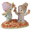 Front right angle view of the Precious Moments You Make Life More Colorful Autumn Figurine, 231024.