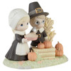 Front right angle view of the Precious Moments Pilgrims Thanksgiving Figurine 'Gather Together With Grateful Hearts', 231022.