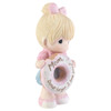 Front right angle view of the Precious Moments Mom, Donut Forget I Love You Figurine (Girl), 193013.