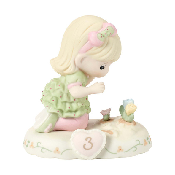 Front view of Precious Moments Growing in Grace Blonde Girl with Flowers Age 3 Birthday Figurine, 142012.