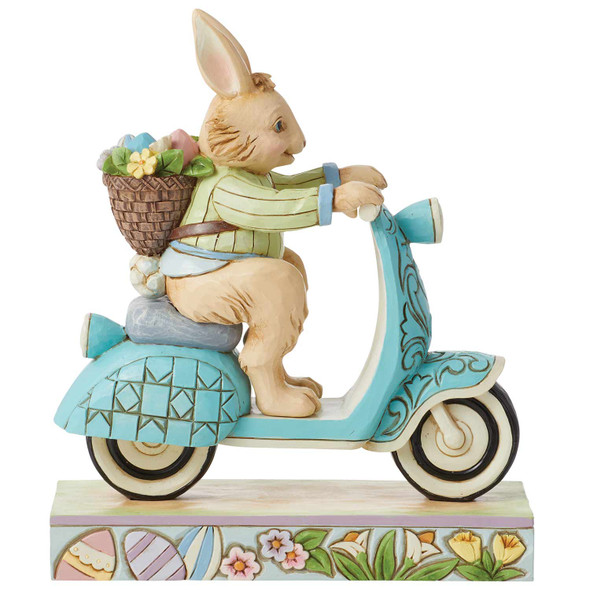 Right side view of the Heartwood Creek Easter Bunny on Scooter Figurine by Jim Shore, 6014390.