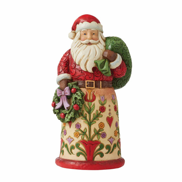 Front view of Heartwood Creek Santa Holding Wreath Christmas Figurine by Jim Shore, 6010823.