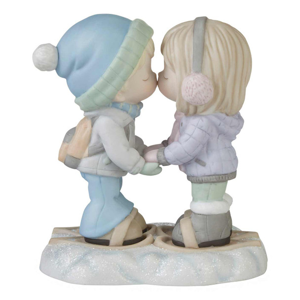 Front view of the Precious Moments Winter Couple Kissing Figurine - I'm Snow In Love With You, 231019.