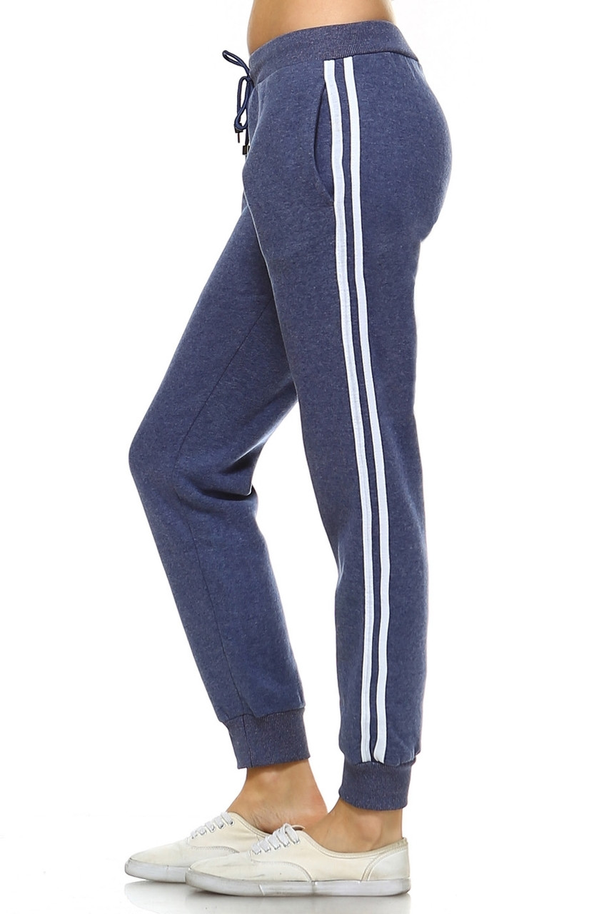 blue joggers with white stripe