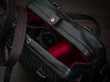 black leather camera bag red interior