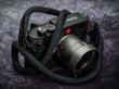 Vi Vante Developed this camera strap as a quality alternative to cooph, artisan artist, and rock n roll. The competitors side protection deforms and doesn't have finished edges. Our signature red stitch is classic to Vi Vante.