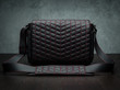 Vi Vante black leather camera bag with red stitching and red interior