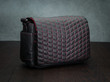 Vi Vante black leather camera bag with red stitching and red interior