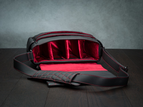 Vi Vante black leather camera bag with red stitching and red interior