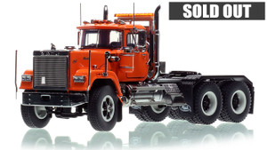 1:50 scale model of Mack Superliner Heavy Spec Tandem Axle Tractor - Orange over Black 1:50 scale model of Mack Superliner Heavy Spec Tandem Axle Tractor - Orange over Black