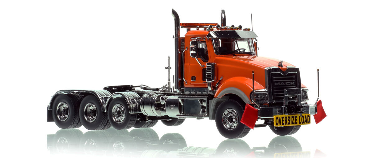 1:50 scale diecast model of Mack Titan Tri-axle Tractor - Orange 2010 over Black