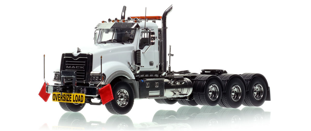 1:50 scale diecast model of Mack Titan Tri-axle Tractor - White over Black