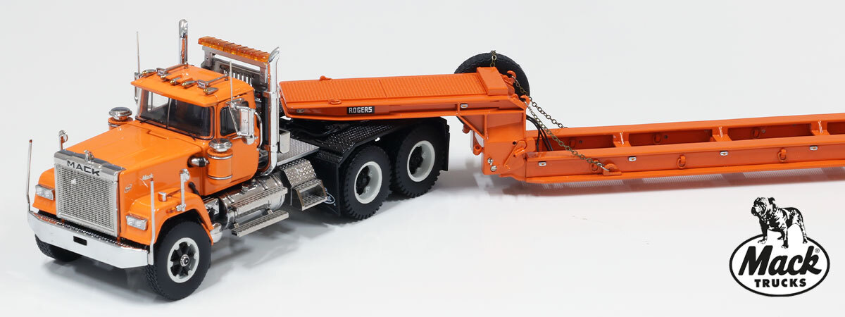 1:50 scale diecast model of  Mack Superliner Heavy Spec Tandem Axle Tractor - Orange over Black