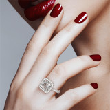 Platinum Halo Diamond Engagement Ring with an Asscher Cut Diamond on hand