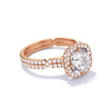 CUSHION CUT DIAMOND ENGAGEMENT RING WITH A WRAPPED HALO CHANCE PAVE SETTING IN 18K ROSE GOLD