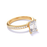 EMERALD CUT DIAMOND ENGAGEMENT RING WITH A CLASSIC 4 PRONG THREE PHASES PAVE SETTING IN 18K YELLOW GOLD