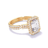 EMERALD CUT DIAMOND ENGAGEMENT RING WITH A WRAPPED HALO CHANCE PAVE SETTING IN 18K YELLOW GOLD