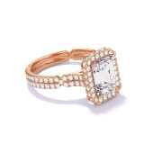 EMERALD CUT DIAMOND ENGAGEMENT RING WITH A WRAPPED HALO CHANCE PAVE SETTING IN 18K ROSE GOLD