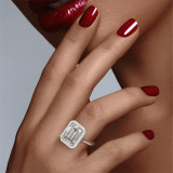 Emerald Cut Halo Engagement Ring with a Platinum Slim Three Phases Setting on hand