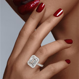 Emerald Cut Halo Ring on hand