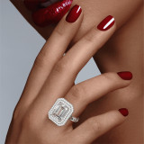 Emerald Cut Diamond Double Halo Engagement Ring with a Platinum 16 Link Band on hand