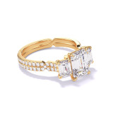 EMERALD CUT DIAMOND ENGAGEMENT RING WITH A THREE STONE CHANCE PAVE SETTING IN 18K YELLOW GOLD