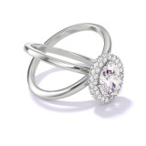 OVAL CUT DIAMOND ENGAGEMENT RING WITH A WRAPPED HALO AXIS SETTING IN PLATINUM