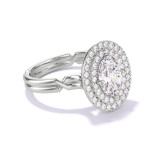 OVAL CUT DIAMOND ENGAGEMENT RING WITH A DOUBLE HALO CHANCE SETTING IN PLATINUM