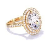 Gold Oval Engagement Ring with a Double Halo Three Phases Pave Setting