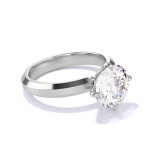 Platinum Round Engagement Ring with a Compass 4 Prong Three Phases Setting