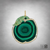 raw malachite apple slice pendant with pave diamonds and emeralds in an 18 karat yellow gold frame