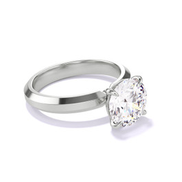 Platinum Round Engagement Ring with a Classic 4 Prong Three Phases Setting