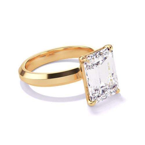 Solitaire Emerald Cut Engagement Ring on a Three Phases Gold Setting