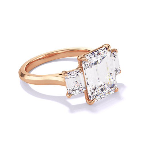 Rose Gold Emerald Cut Three Stone Engagement Ring on a Slim Three Phases Band