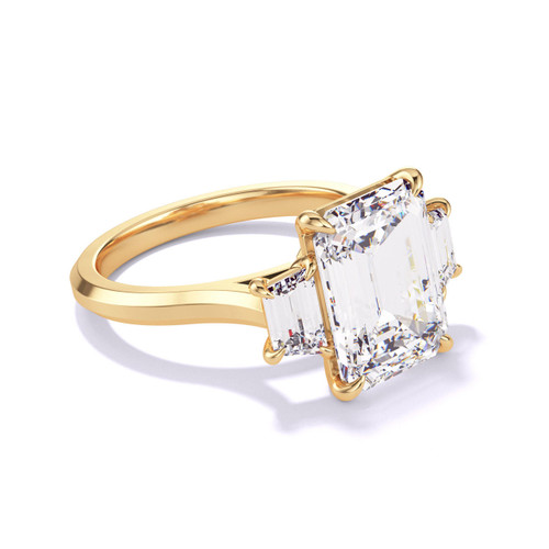 Emerald Cut Trapezoid Flank Engagement Ring on a Slim Three Phases Gold Band
