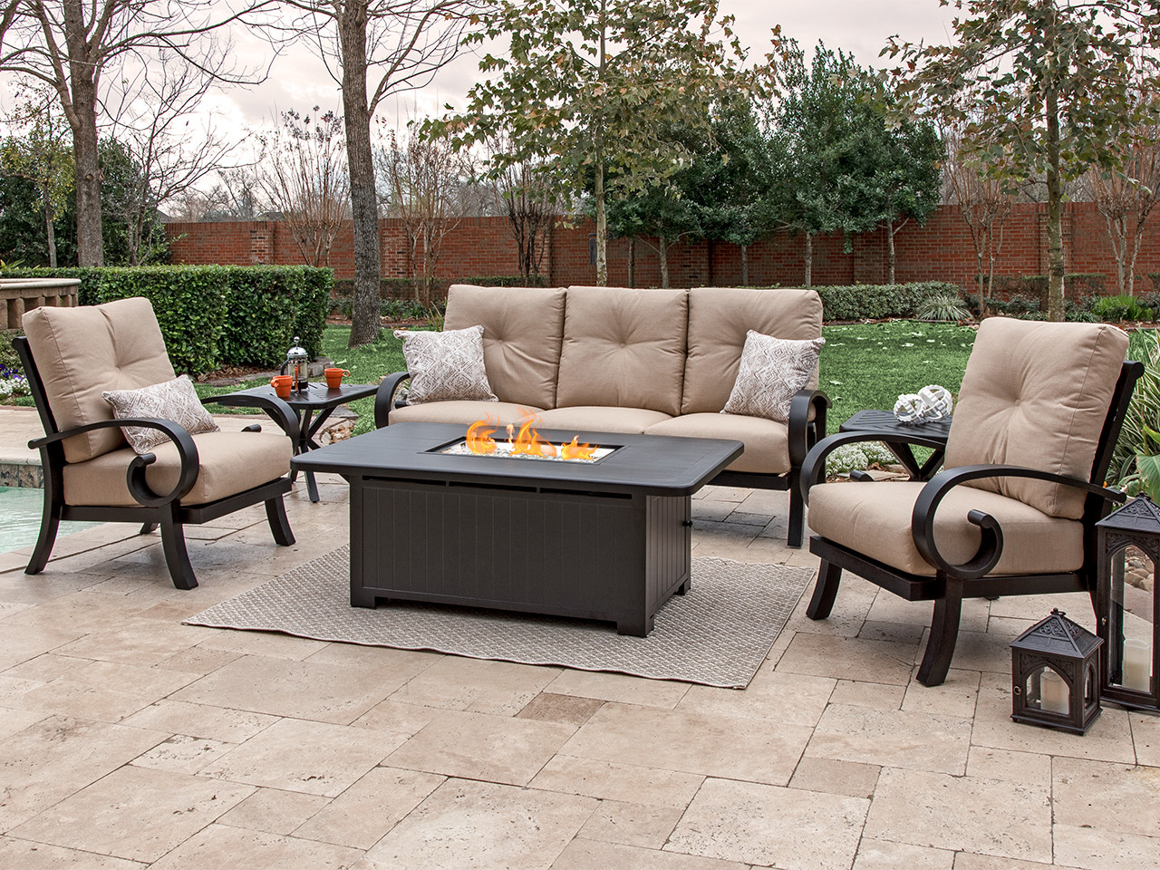 Solstice Aged Bronze Aluminum Flagship Stone 4 pc. Cushion Sofa Seating with 58 x 36 in. LP Fire Pit Coffee Table