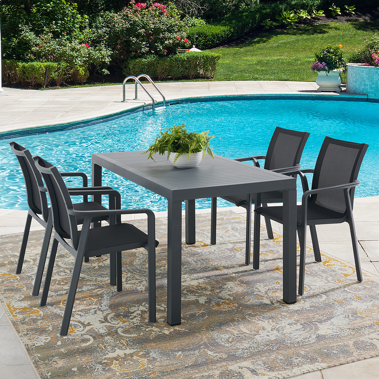 Pacifica Dark Grey Polypropylene and Black Sling 5 Pc. Dining Set with 55 x 32 in. Table