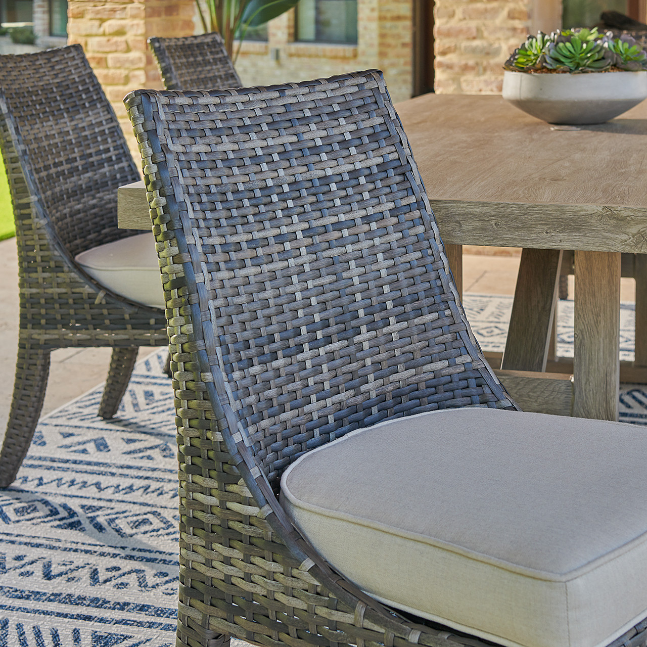 Tangiers Outdoor Wicker with Cushions 9 Piece Side Dining Set + 84-112 x 44 in. Extension Table