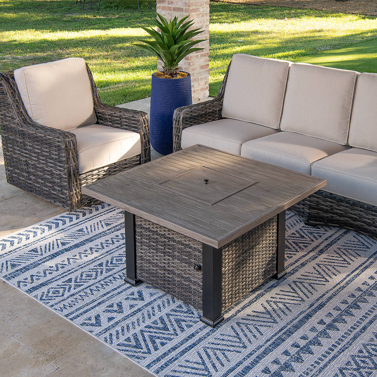 Tangiers Canola Seed Outdoor Wicker with Cushions 3 Piece Swivel Sofa Group + 42 in. Fire Pit Coffee Table